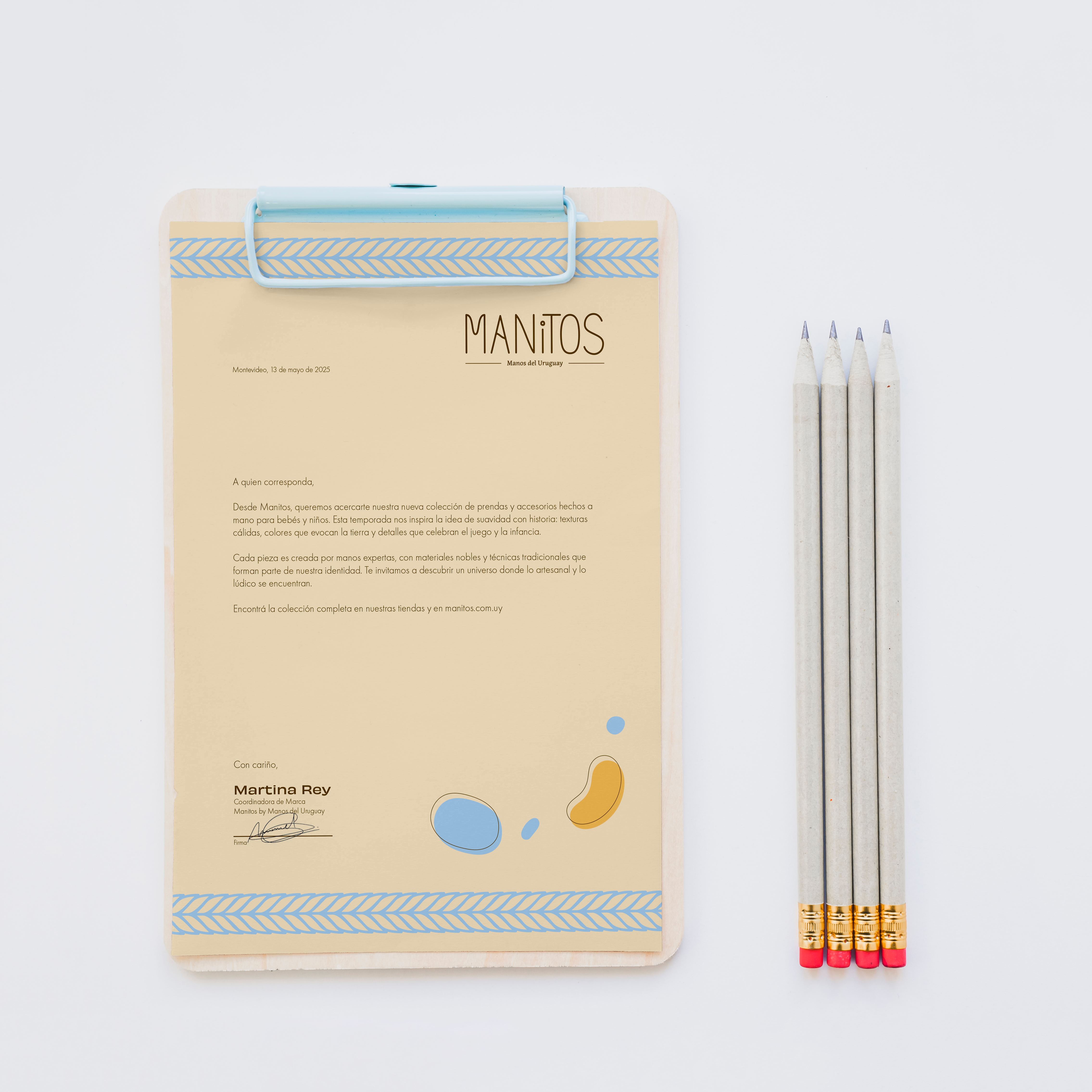 Manitos notebook design with brand graphics
